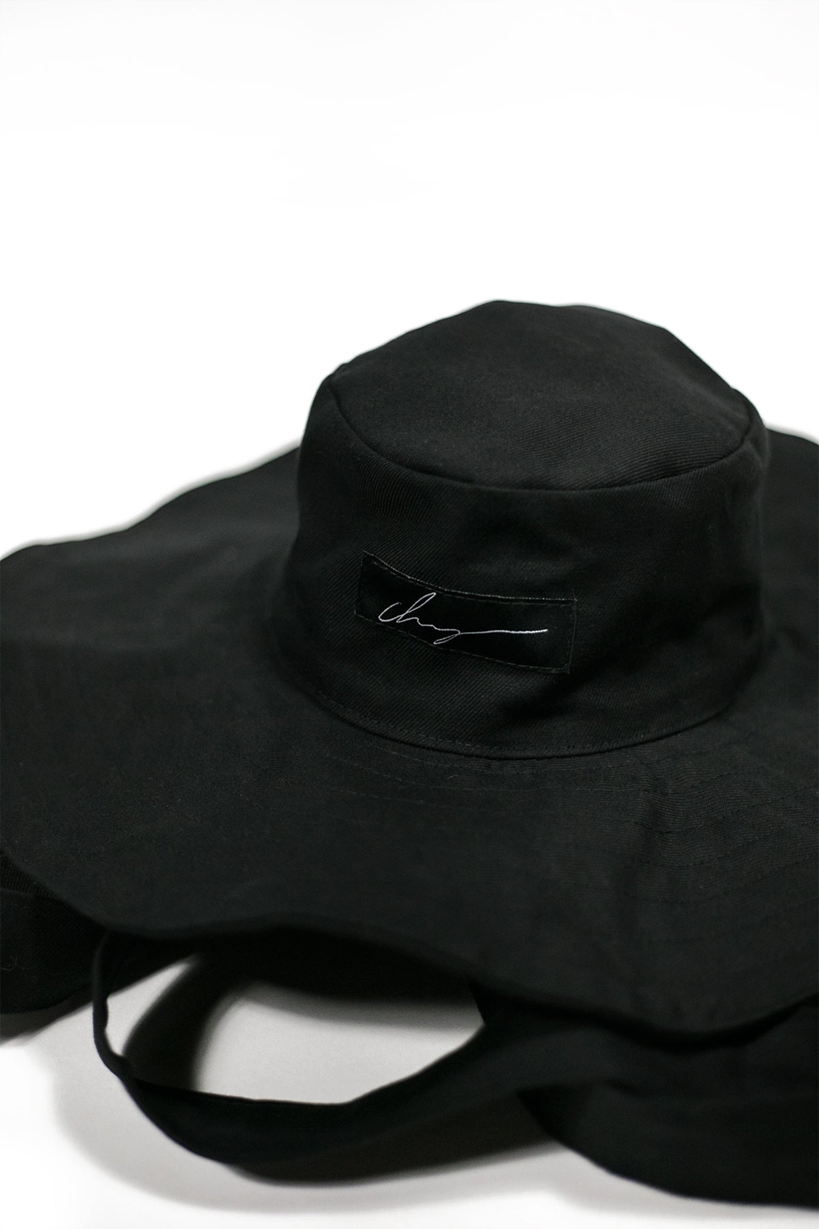 Black largebrim hat